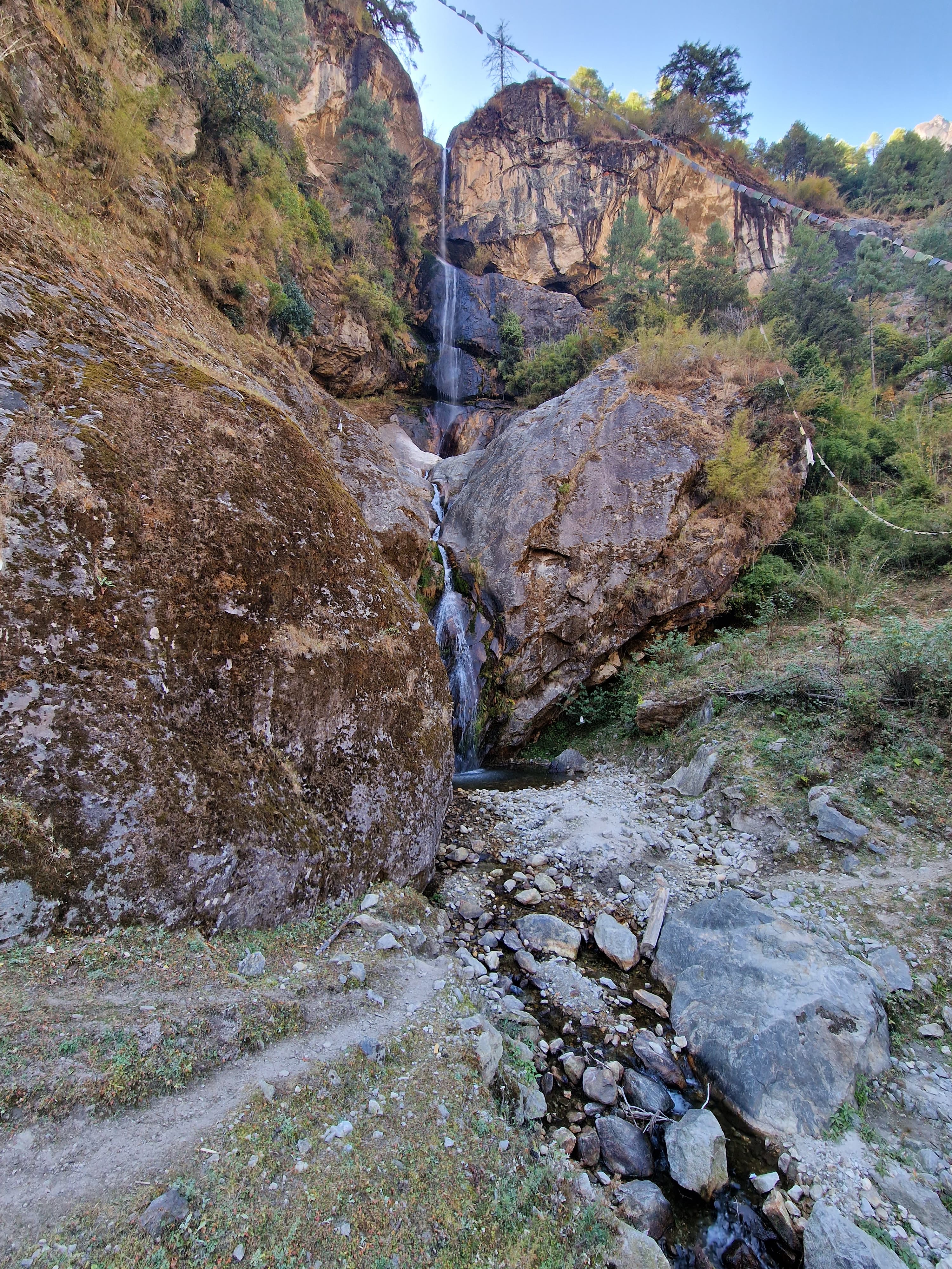 Trekkers crossing glacier